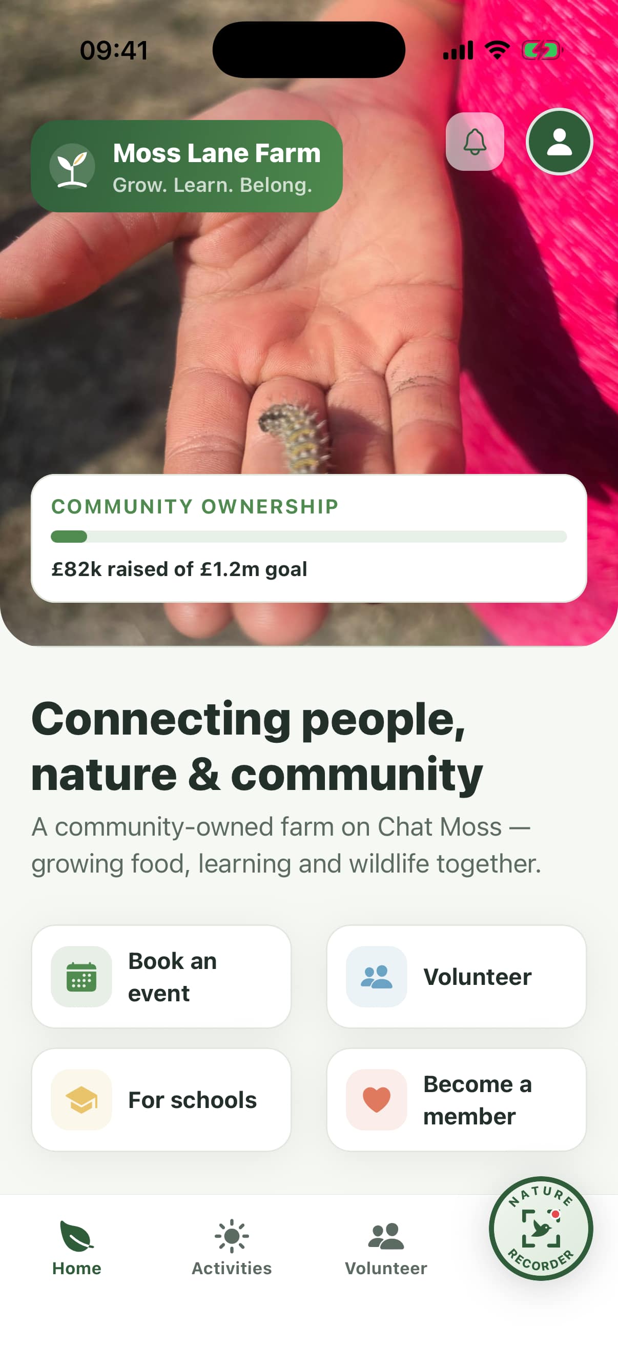 The app's home screen: farm photos and the community ownership goal
